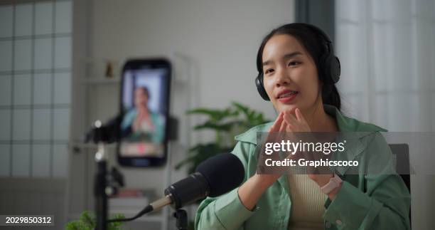 young woman life  making video live broadcast on smartphone at home. - entrepreneur stockfoto's en -beelden