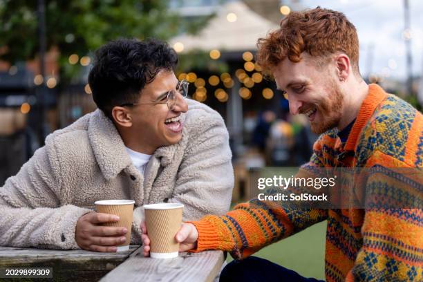 laughter and romance - social gathering stock pictures, royalty-free photos & images