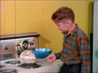 1955 Boy Cooking Jiffy Pop Popcorn On Stove Industrial High-Res Stock Video  Footage - Getty Images