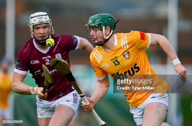 Northern Ireland , United Kingdom - 25 February 2024; Conal Cunning of Antrim in action against Darren Morrissey of Galway during the Allianz Hurling...