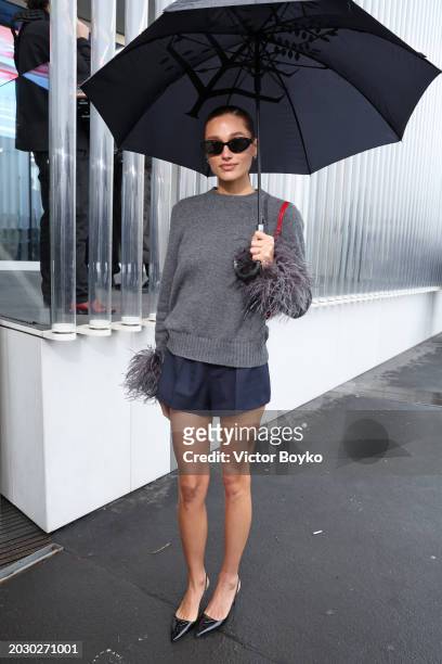 Sasha Meneghel is seen arriving at the Prada fashion show during the Milan Fashion Week Womenswear Fall/Winter 2024-2025 on February 22, 2024 in...