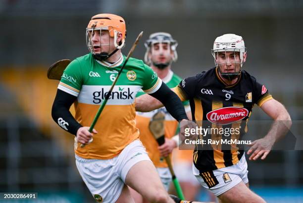 Kilkenny , Ireland - 25 February 2024; Cillian Kiely of Offaly is tackled by Mikey Carey of Kilkenny during the Allianz Hurling League Division 1...