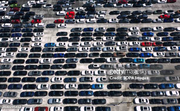 Rows of used cars are seen in this aerial view of the Manheim Auto Auction facility in Ocoee, which is the world's largest wholesale auto auction,...