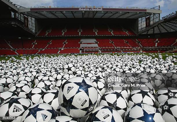 Selection of adidas Finale footballs are arrayed on the pitch at Old Trafford May 25, 2003 in Manchester, England. To commemorate the final of the...