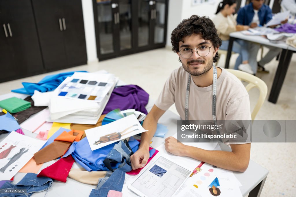 Happy student smiling in a textile class at university