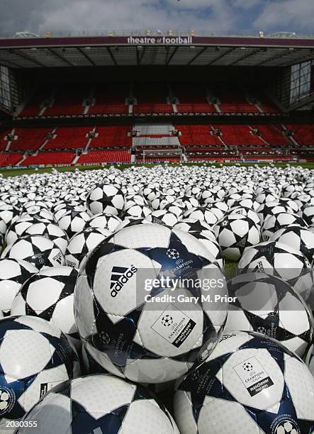 Selection of adidas Finale footballs are arrayed on the pitch at Old Trafford May 25, 2003 in Manchester, England. To commemorate the final of the...