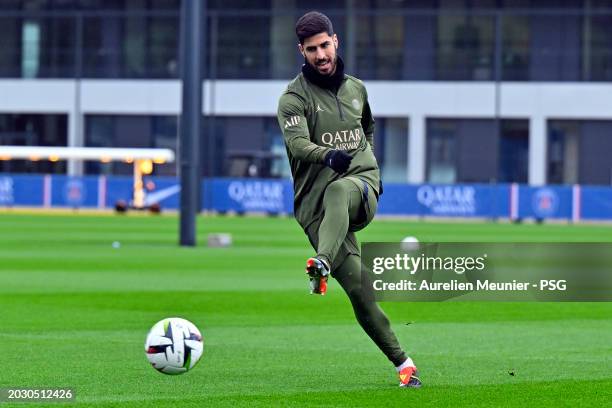 Marco Asensio passes the ball during a Paris Saint-Germain training session at Campus PSG on February 22, 2024 in Paris, France.