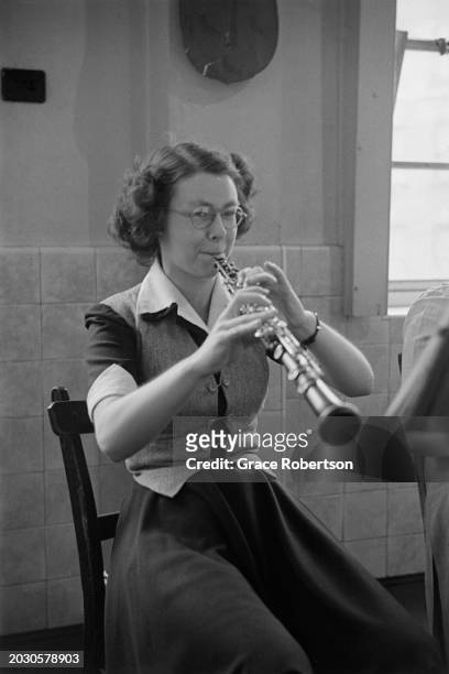 Oboist Johan Sherman of the London County Council's Symphony Orchestra for Schoolchildren, during a five day holiday programme rehearsing for a...