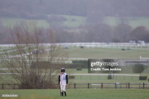 Dejected Rachael Blackmore takes the long walk back to the stands after falling off Gin On Lime in the Glenfarclas Cross Country Steeplechase during...