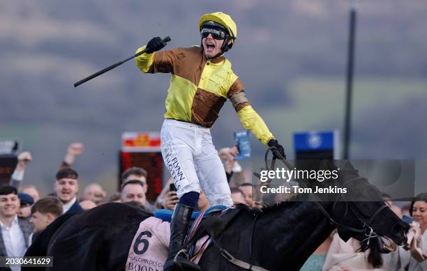 Jockey Paul Townend riding Galopin Des Champs celebrates winning the Gold Cup during racing on day four of the Cheltenham National Hunt jump racing...