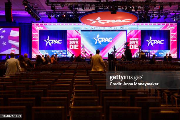 Attendees arrive to the main ballroom for the start of the General Session of the Conservative Political Action Conference at Gaylord National Resort...