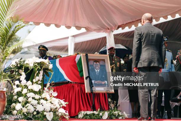 Namibian President Nangolo Mbumba pays respect in front of the coffin of the late Namibian President Hage Geingob at Heroes Acre, south of Windhoek,...