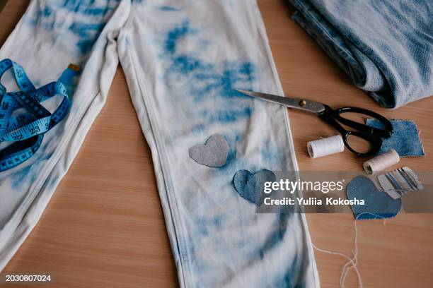 old jeans upcycling idea. crafting with denim, recycling old clothers, hobby, diy activity - upcycling stock pictures, royalty-free photos & images