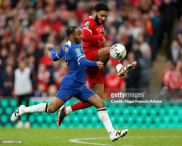 Raheem Sterling of Chelsea and Joe Gomez of Liverpool challenge during the Carabao Cup Final match between Chelsea and Liverpool at Wembley Stadium...