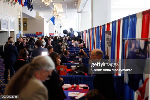 People walk around media row at the Conservative Political Action Conference at Gaylord National Resort Hotel And Convention Center on February 22,...