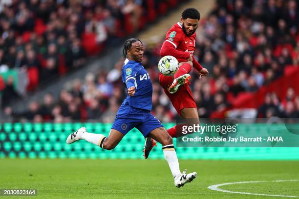 Raheem Sterling of Chelsea is tackles by Joe Gomez of Liverpool during the Carabao Cup Final match between Chelsea and Liverpool at Wembley Stadium...