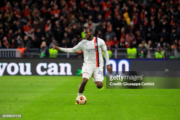 Yunus Musah of AC Milan in action during the UEFA Europa League 2023/24 knockout round play-offs second leg match between Stade Rennais FC and AC...