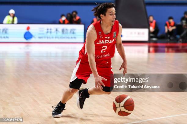 Yuki Togashi of Japan drives to the basket during the FIBA Basketball Asia Cup qualifier Group C game between Japan and Guam at Ariake Coliseum on...