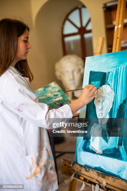 fine art students painting - art class stock pictures, royalty-free photos & images