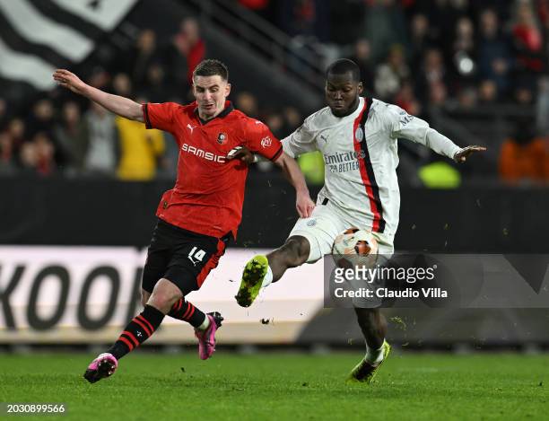 Yunus Musah of AC Milan competes for the ball with Benjamin Bourigeaud of Stade Rennais FC during the UEFA Europa League 2023/24 playoff second leg...