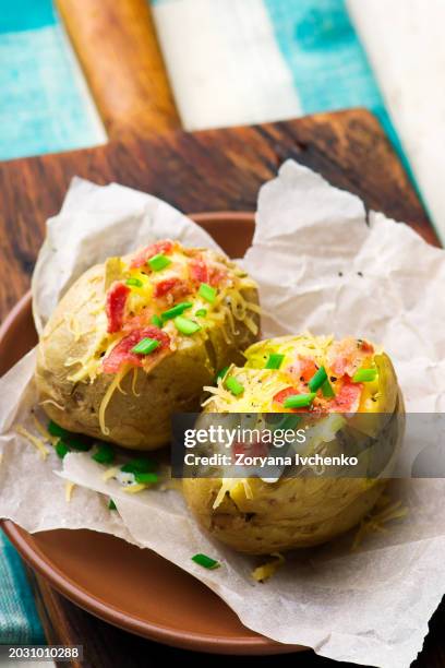 baked potato with cheese and bacon - baked potato stock pictures, royalty-free photos & images