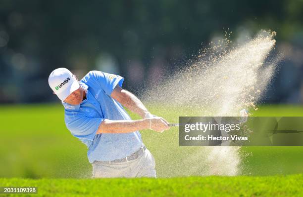 Ryan Palmer of the United States plays a shot from a bunker on the 15th hole during the first round of the Mexico Open at Vidanta at Vidanta Vallarta...