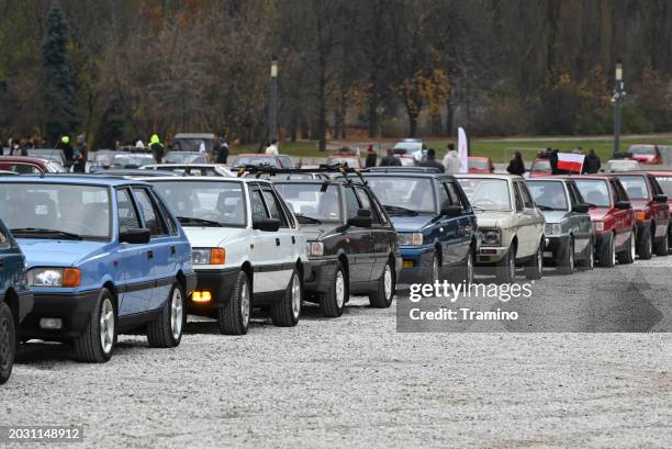 fso polonez vehicles on a parking - compact car parking stock pictures, royalty-free photos & images