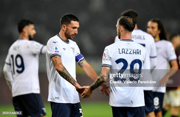 Danilo Cataldi and Manuel Lazzari of SS Lazio celebrate after the team's victory in the Serie A TIM match between Torino FC and SS Lazio at Stadio...