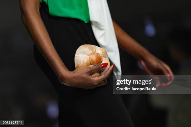 Model, bag detail, walks the runway at the Moschino fashion show during the Milan Fashion Week Womenswear Fall/Winter 2024-2025 on February 22, 2024...