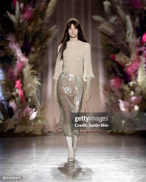 Model walks the runway at the Genny fashion show during the Milan Fashion Week Womenswear Fall/Winter 2024-2025 on February 22, 2024 in Milan, Italy.