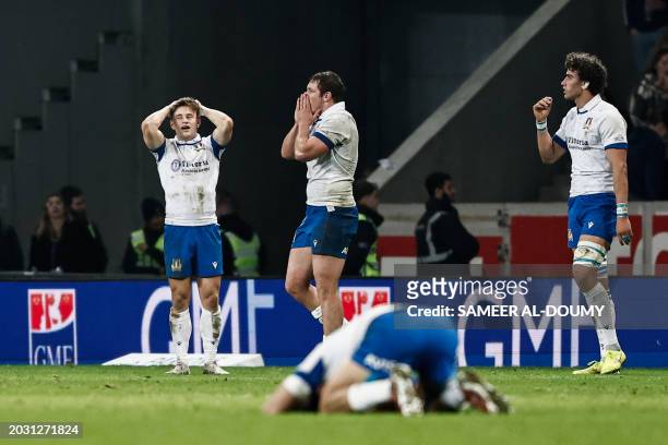 Italy's players react at the end of the Six Nations rugby union international match between France and Italy at Stade Pierre Mauroy in...