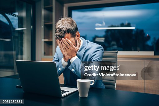 Businessman working late in the office. Businessman working late in the office.