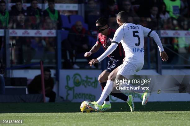 Juan Jesus of SSC Napoli and Gianluca Lapadula, wearing number 9 for Cagliari Calcio, are competing during the Serie A TIM match between Cagliari...