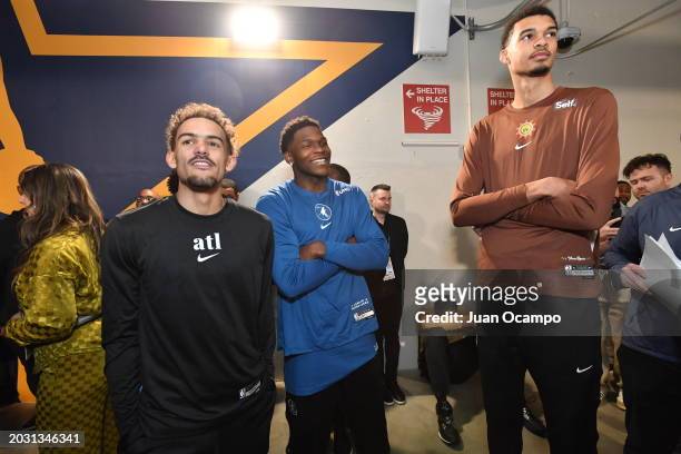 Trae Young of the Atlanta Hawks, Anthony Edwards of the Minnesota Timberwolves and Victor Wembanyama of the San Antonio Spurs during the as part of...