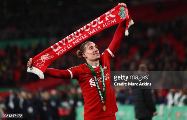 Liverpool's Kostas Tsimikas celebrates after winning the Carabao Cup Final match between Chelsea and Liverpool at Wembley Stadium on February 25,...
