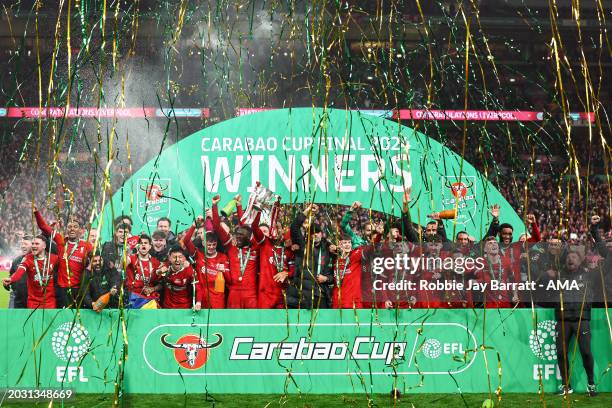 Liverpool players celebrate as they lift the Carabao Cup Trophy as Liverpool win the Carabao Cup during the Carabao Cup Final match between Chelsea...