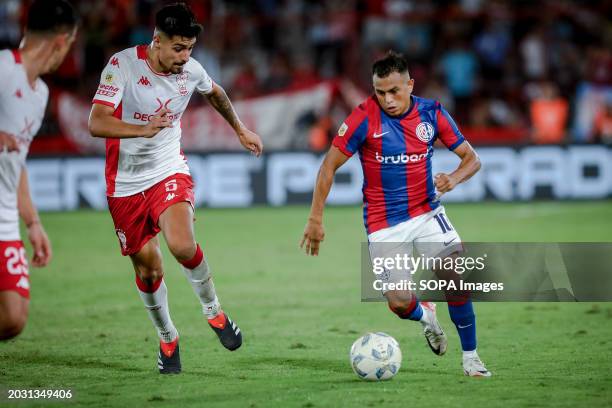 Williams Alarcon of Huracan and Nahuel Barrios of San Lorenzo seen in action during the match between Huracan and San Lorenzo as part of Fecha 7 -...