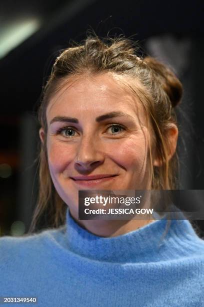 France's Justine Braisaz-Bouchet poses for photo during a press meeting in Stockholm on February 25, 2024 on the eve of the Biathlon Championship at...