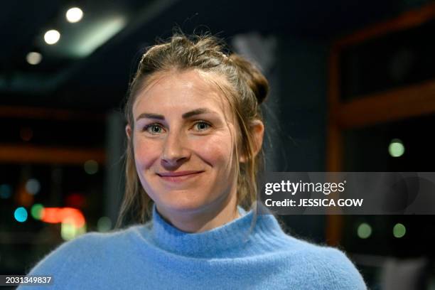 France's Justine Braisaz-Bouchet poses for photo during a press meeting in Stockholm on February 25, 2024 on the eve of the Biathlon Championship at...