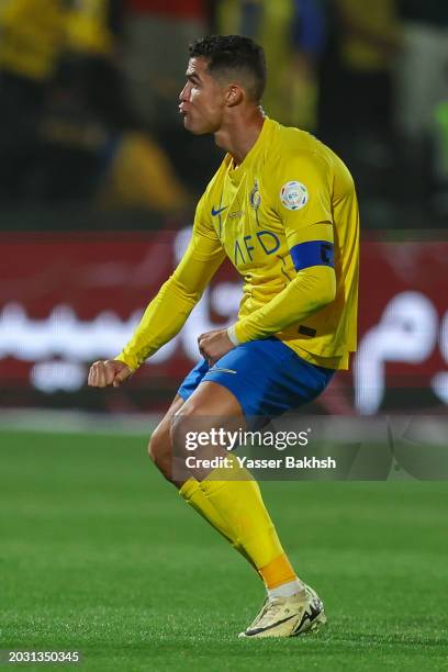 Cristiano Ronaldo of Al Nassr celebrates after scoring the 1st goal during the Saudi Pro League match between Al-Shabab and Al-Nassr at Al-Shabab...