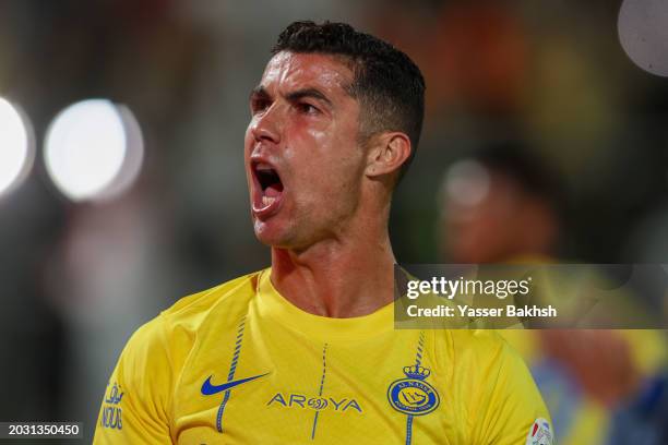 Cristiano Ronaldo of Al Nassr celebrates after scoring the 1st goal during the Saudi Pro League match between Al-Shabab and Al-Nassr at Al-Shabab...