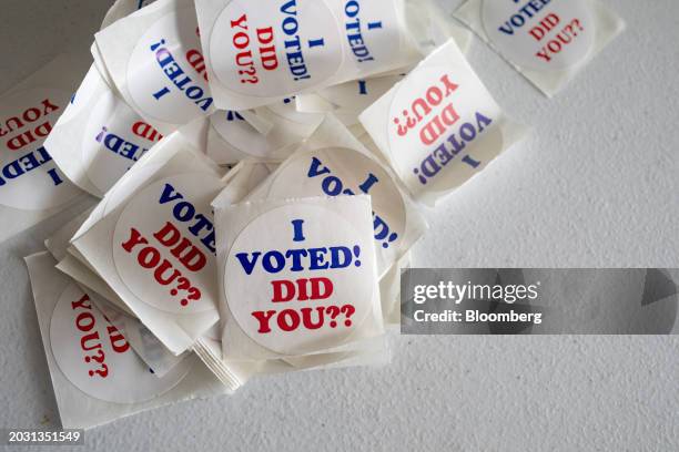Voted" stickers on a table on the last day of early voting at a polling station inside Wayne County Community College Northwest Campus in Detroit,...