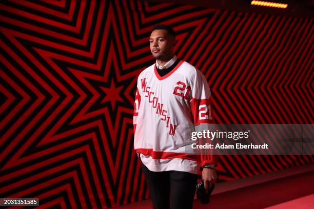 Seth Jones of the Chicago Blackhawks wears a jersey in honor of Chris Chelios for arrival at the United Center prior to the game between the Chicago...