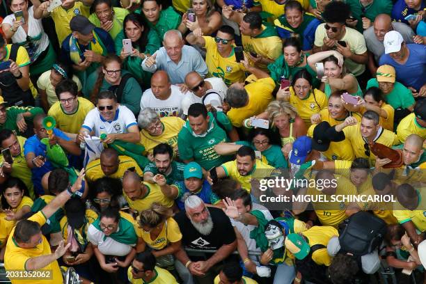 Aerial view of former Brazilian President Jair Bolsonaro greeting supporters during a rally in Sao Paulo, Brazil, on February 25 to reject claims he...