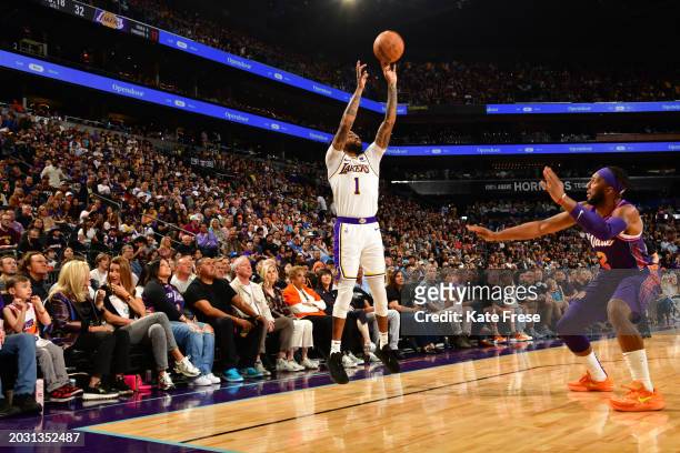 Angelo Russell of the Los Angeles Lakers shoots a three point basket against the Phoenix Suns on February 25, 2024 at Footprint Center in Phoenix,...