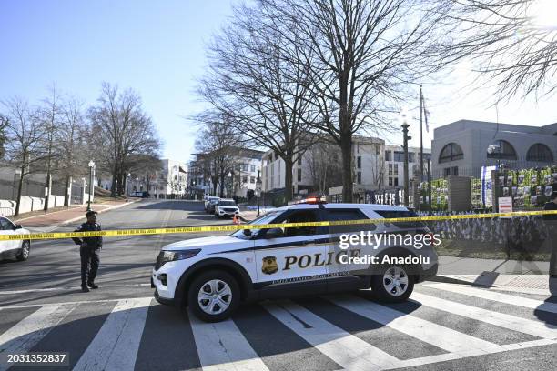 Police take security measures and investigate the crime scene after 25-year-old Aaron Bushnell, an active-duty member of the US Air Force, set...