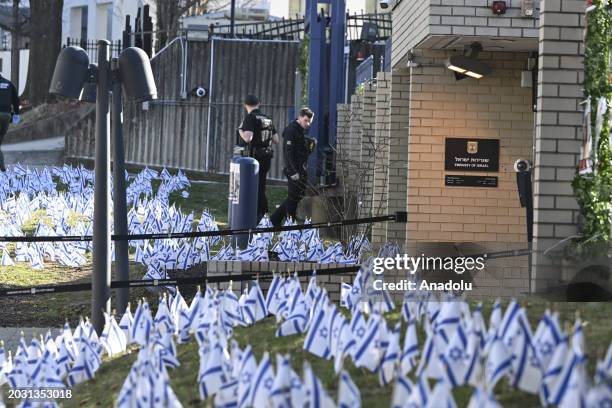 Police take security measures and investigate the crime scene after 25-year-old Aaron Bushnell, an active-duty member of the US Air Force, set...