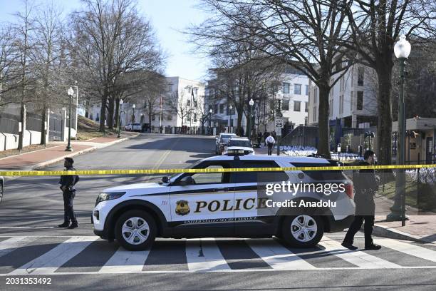 Police take security measures and investigate the crime scene after 25-year-old Aaron Bushnell, an active-duty member of the US Air Force, set...