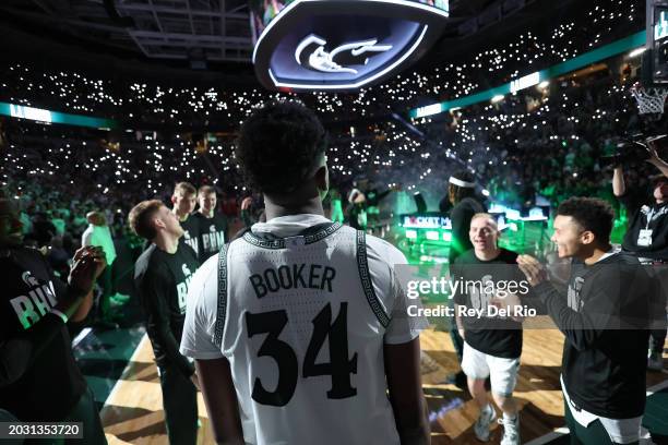 Xavier Booker of the Michigan State Spartans during introductions before a game against Ohio State Buckeyes at Breslin Center on February 25, 2024 in...