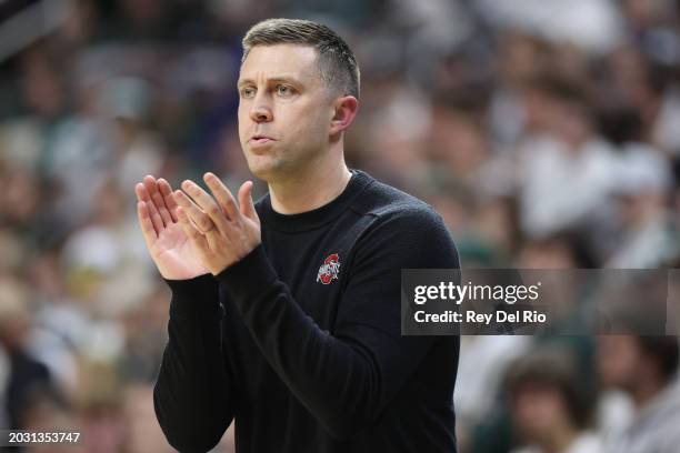 Interim head coach Jake Diebler of the Ohio State Buckeyes looks on during the first half of the game against the Michigan State Spartans at Breslin...